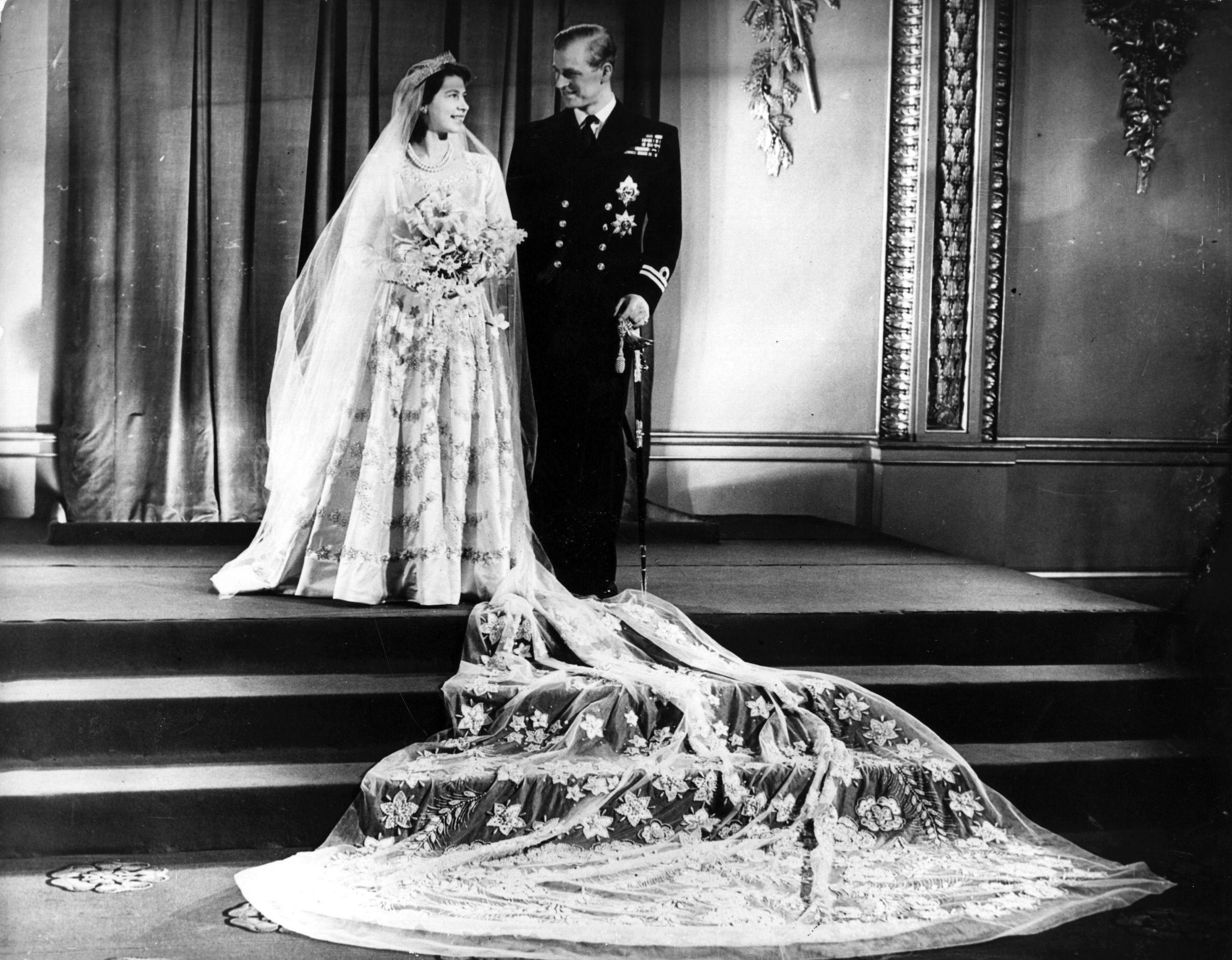 Queen Elizabeth II Used WWII Ration Coupons For Her Wedding Dress