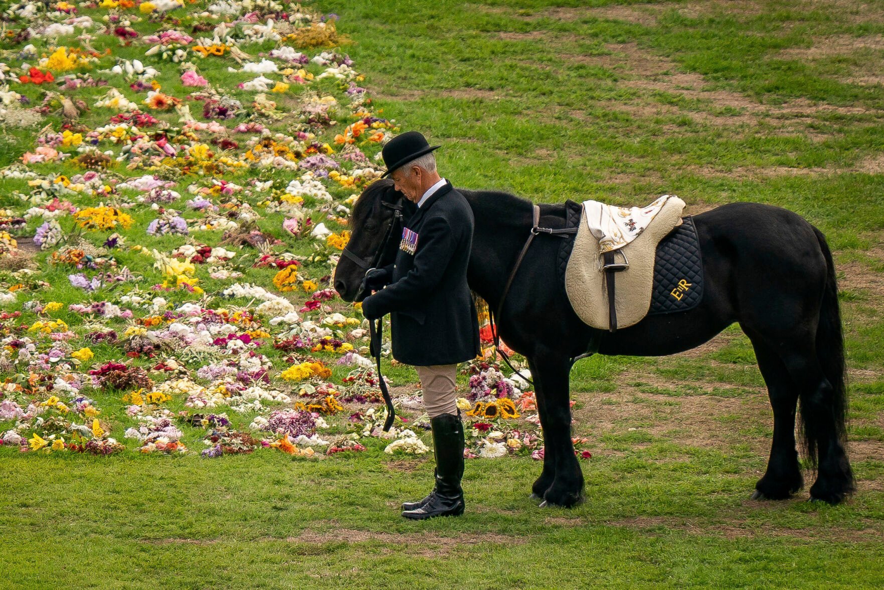 Queen's 'Beloved' Pony Watched On As Her Coffin Was Brought To Windsor Castle
