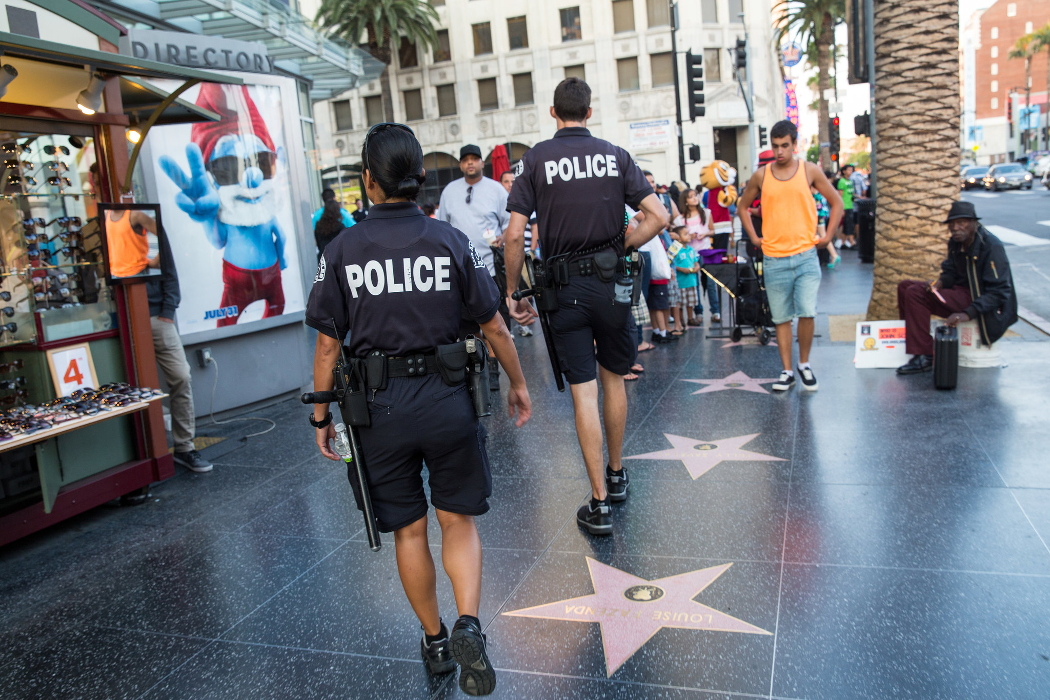 Police walking on the Walk of Fame area