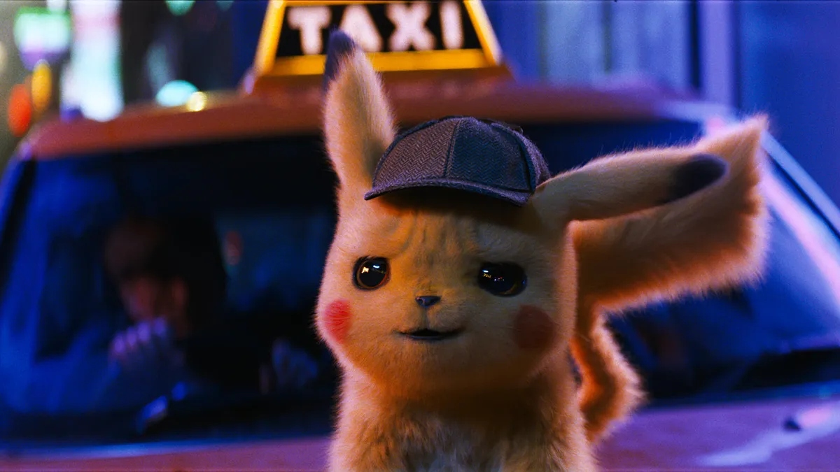 Detective Pikachu character standing on taxi