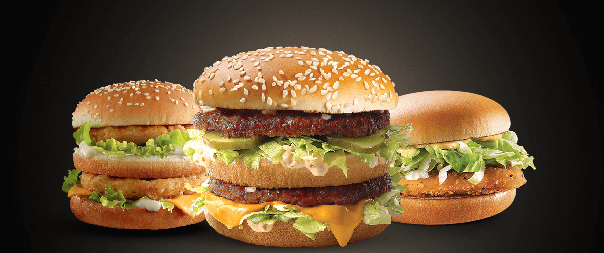Three Mcburgers on a black background