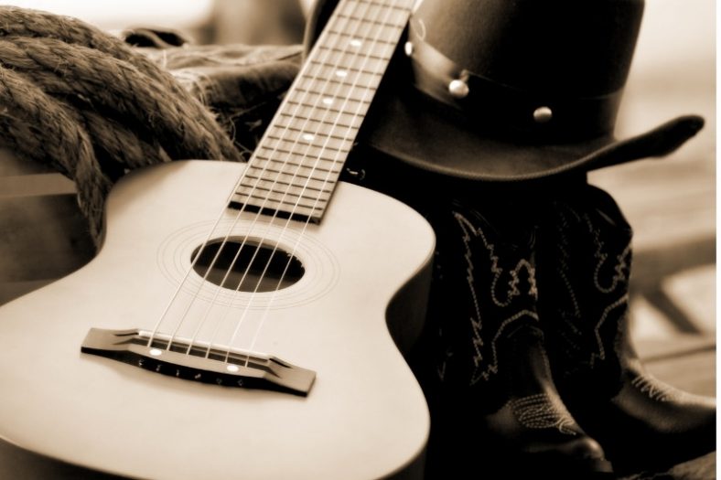 Guitar, hat, and boots
