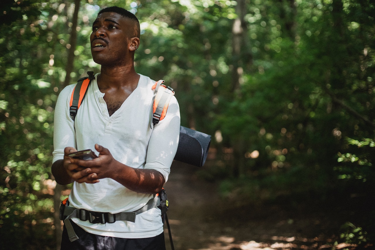 Black Man Got Lost With Smartphone In Forest