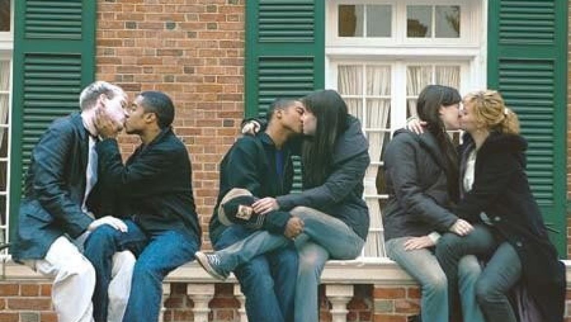 Four Persons Kissing Each Other