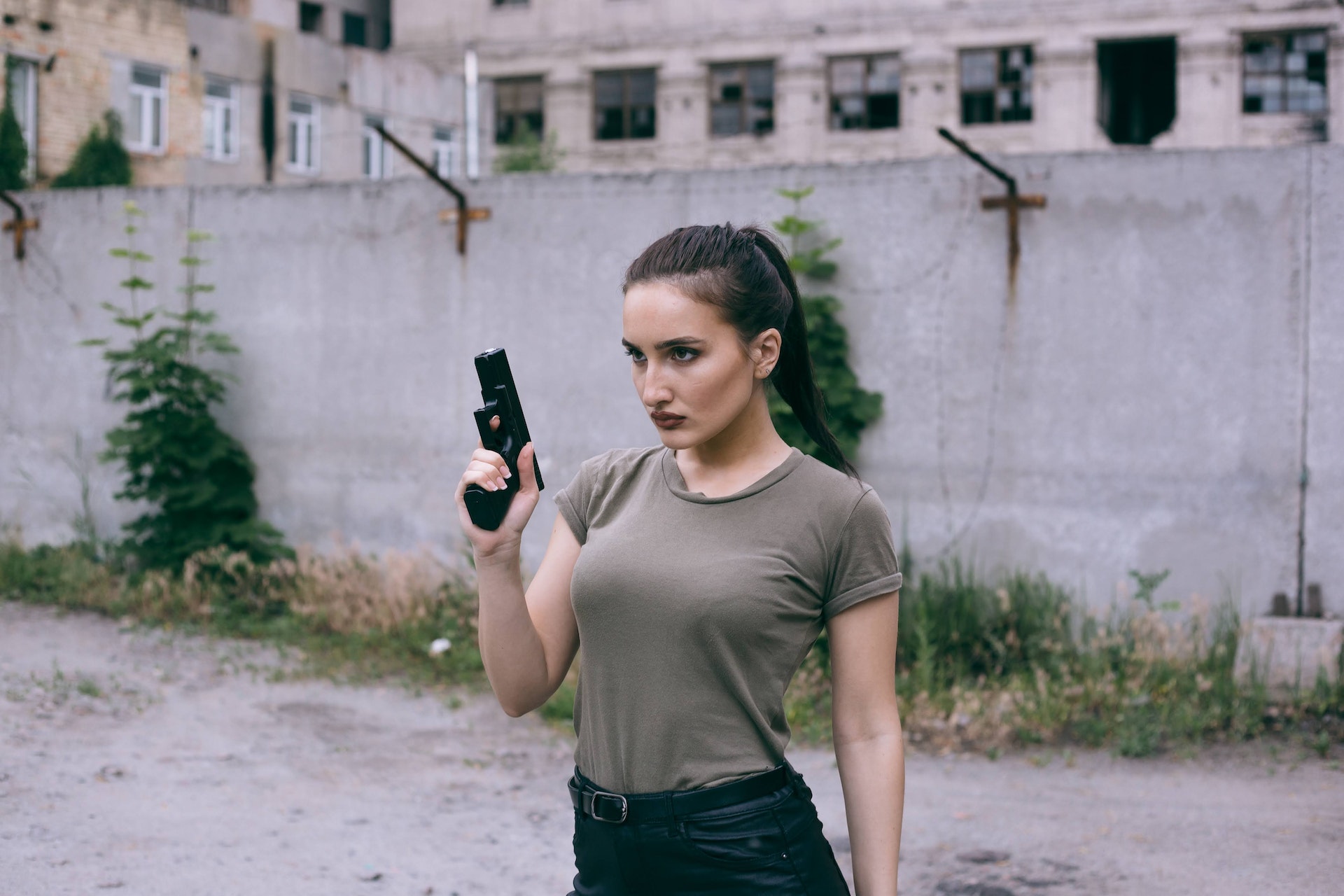 Fierce Woman Holding a Gun