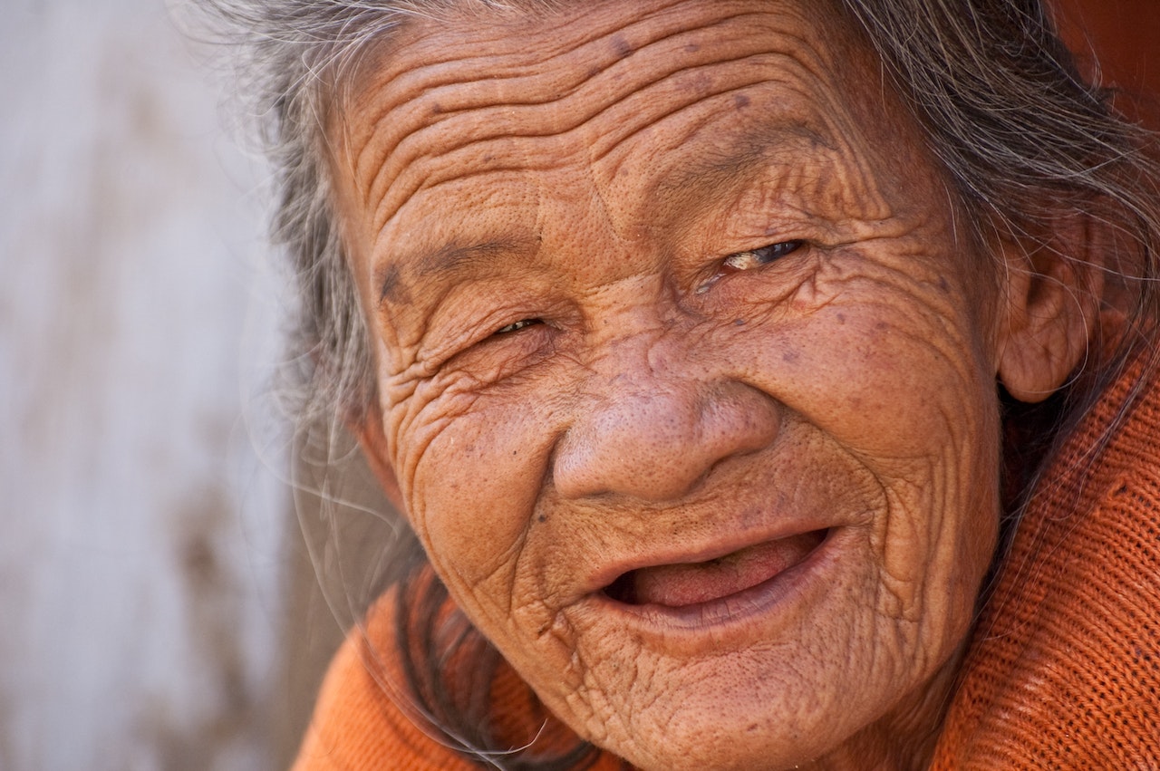 Wrinkly face of an old woman