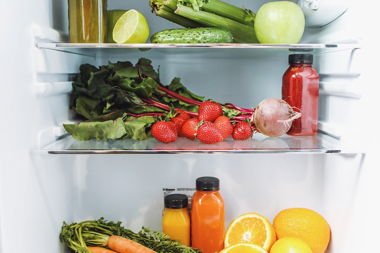 Assorted Fruits and Vegetables in Refrigerator