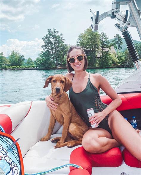 Ella Dorsey relaxing with her dog