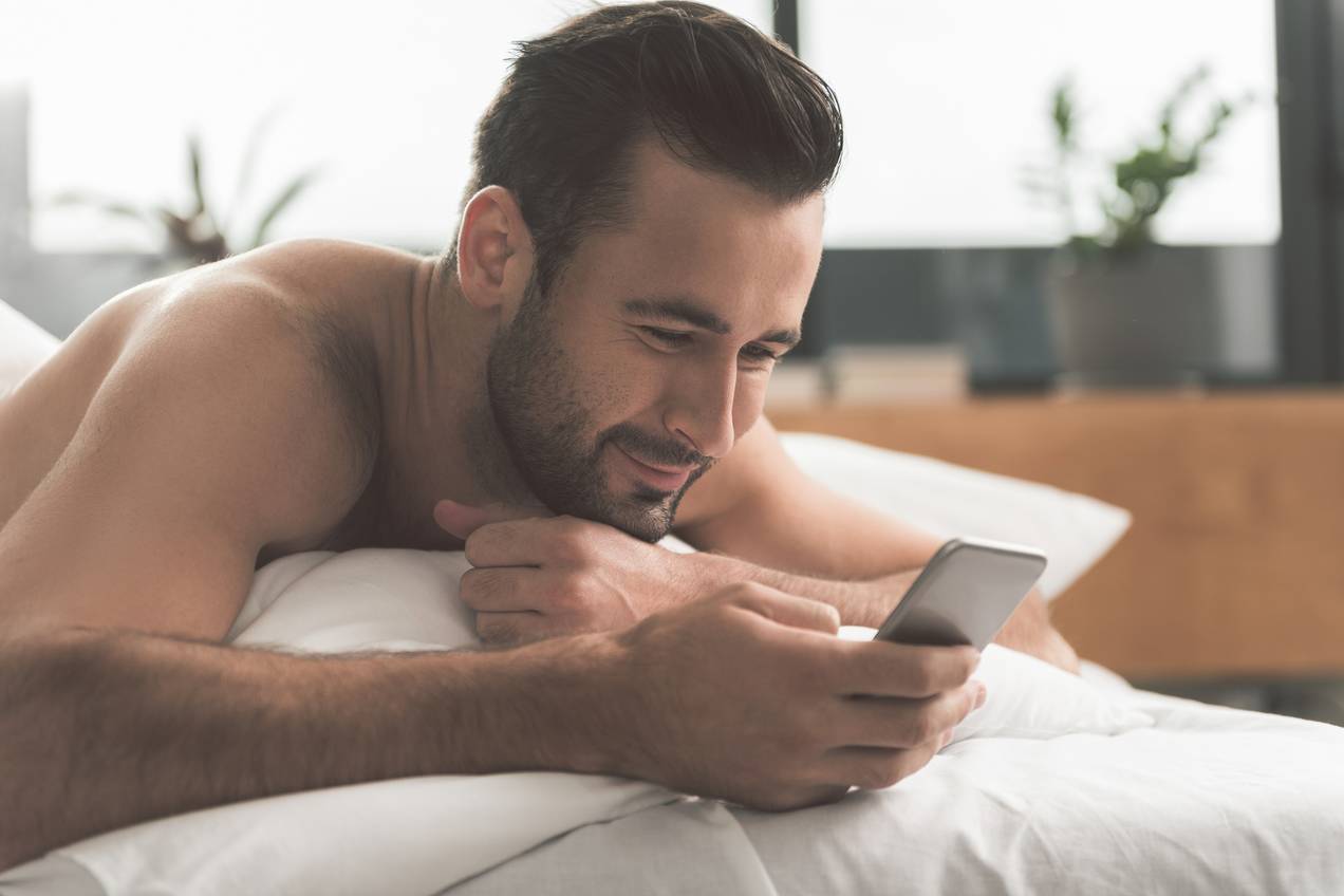 Man Smiling From Sexting