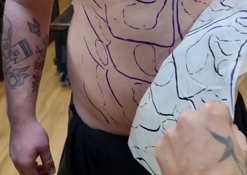 Tattoo stencil on belly
