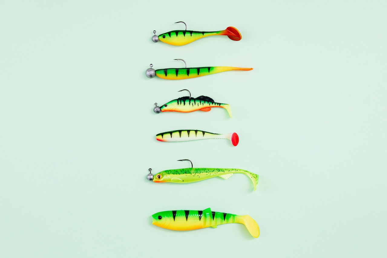 Fishing Lures on Green Surface