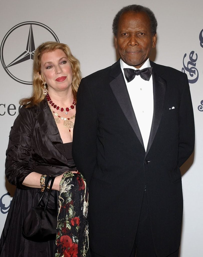 Sidney Poitier with his wife in an award show
