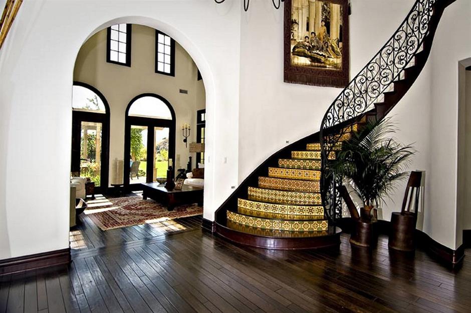 The beautiful staircase on Zendeya's peninsula has a spiral shape with a wooden floor