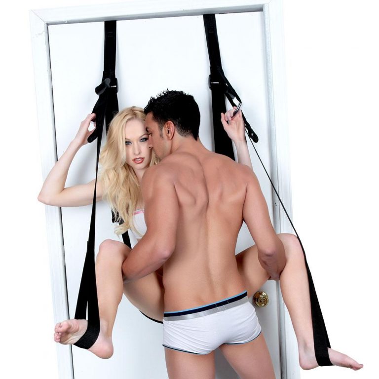 A Couple Having Sex On A Door Swing