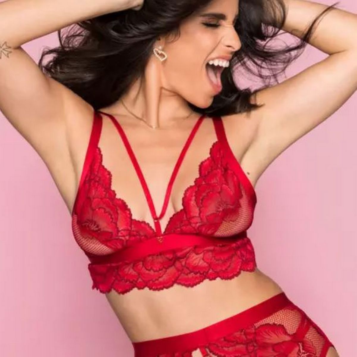 A woman wearing red lace underwear