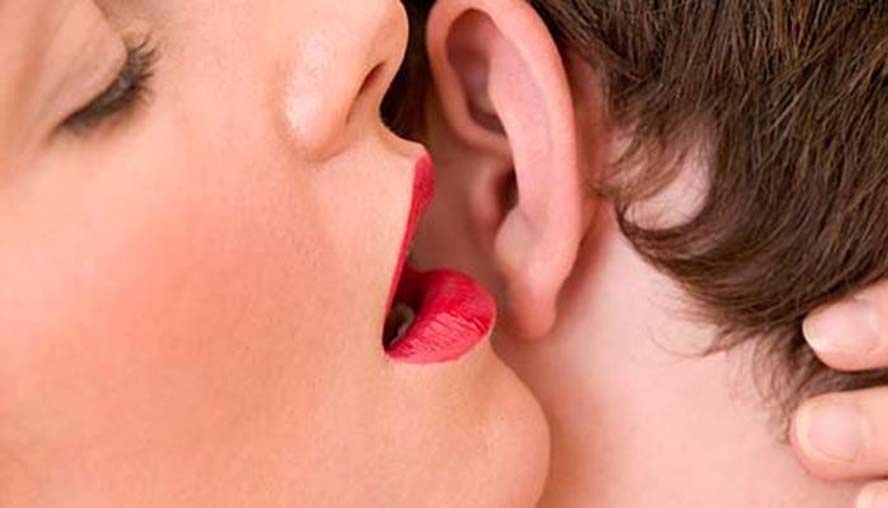 A Woman Talking Dirty On Her Man's Ear