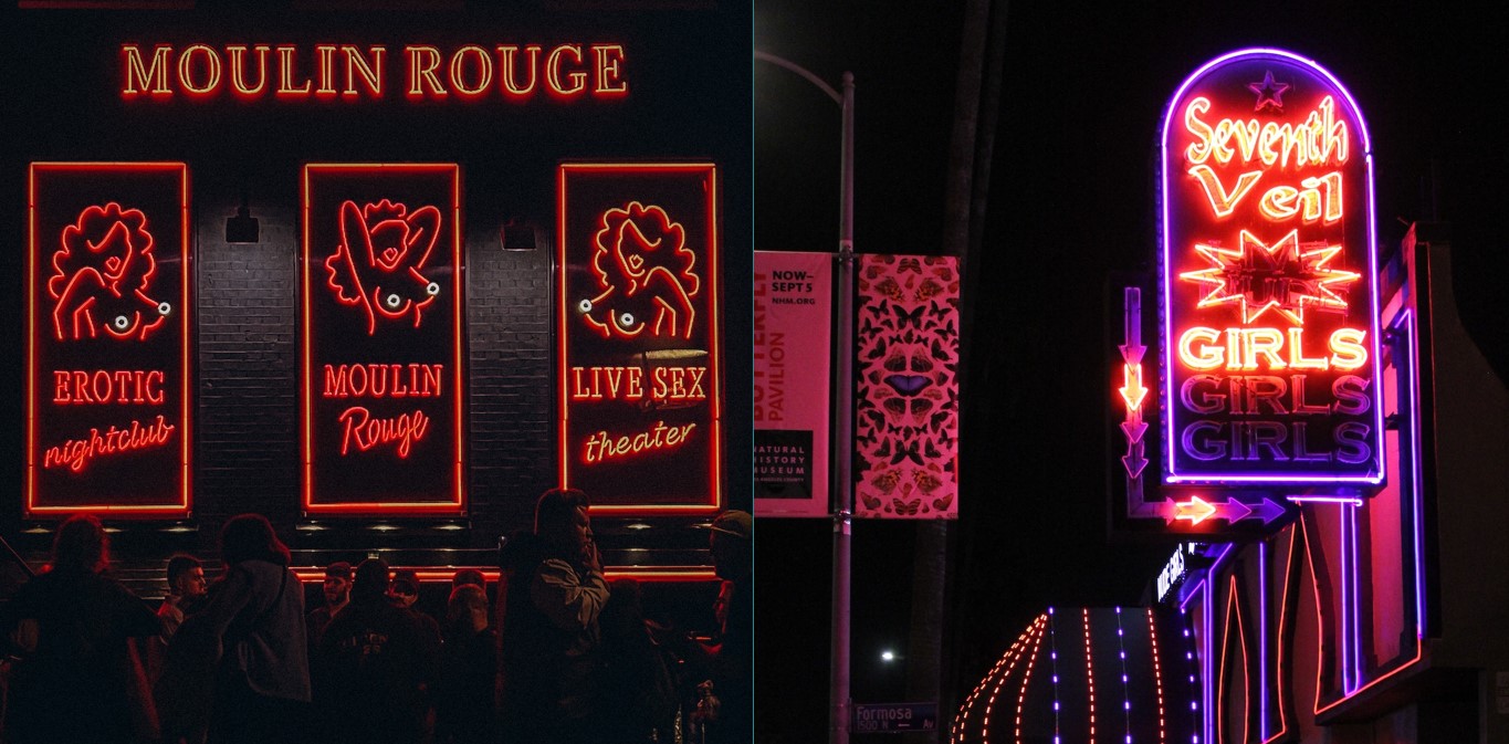 Neon signs of Moulin Rouge strip club, with people outside passing buy; neon sign of Seventh Veil strip club