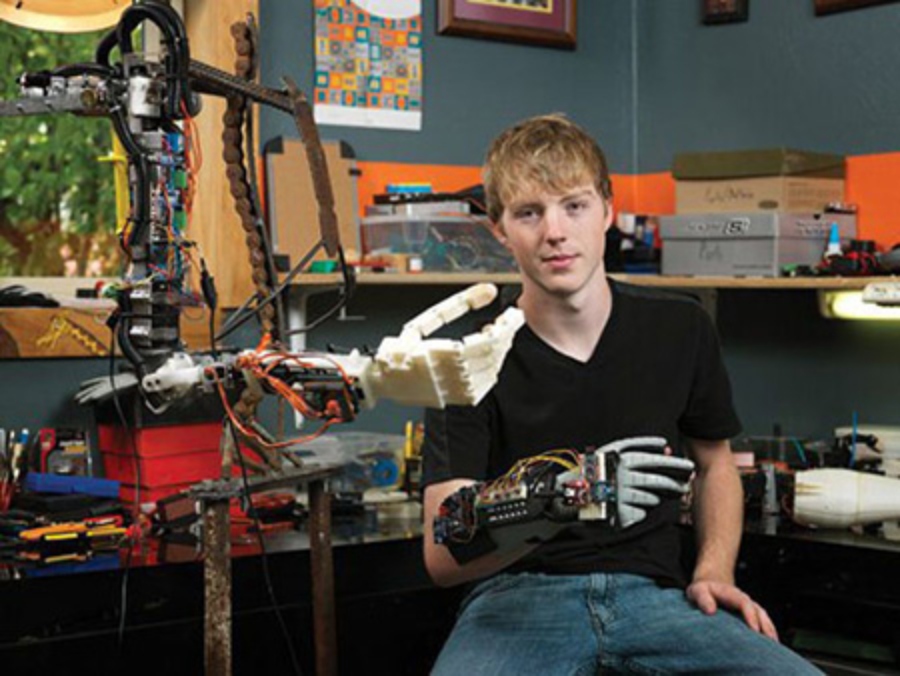 Easton LaChapelle with his robotic arm made out of Nintendo Power Glove