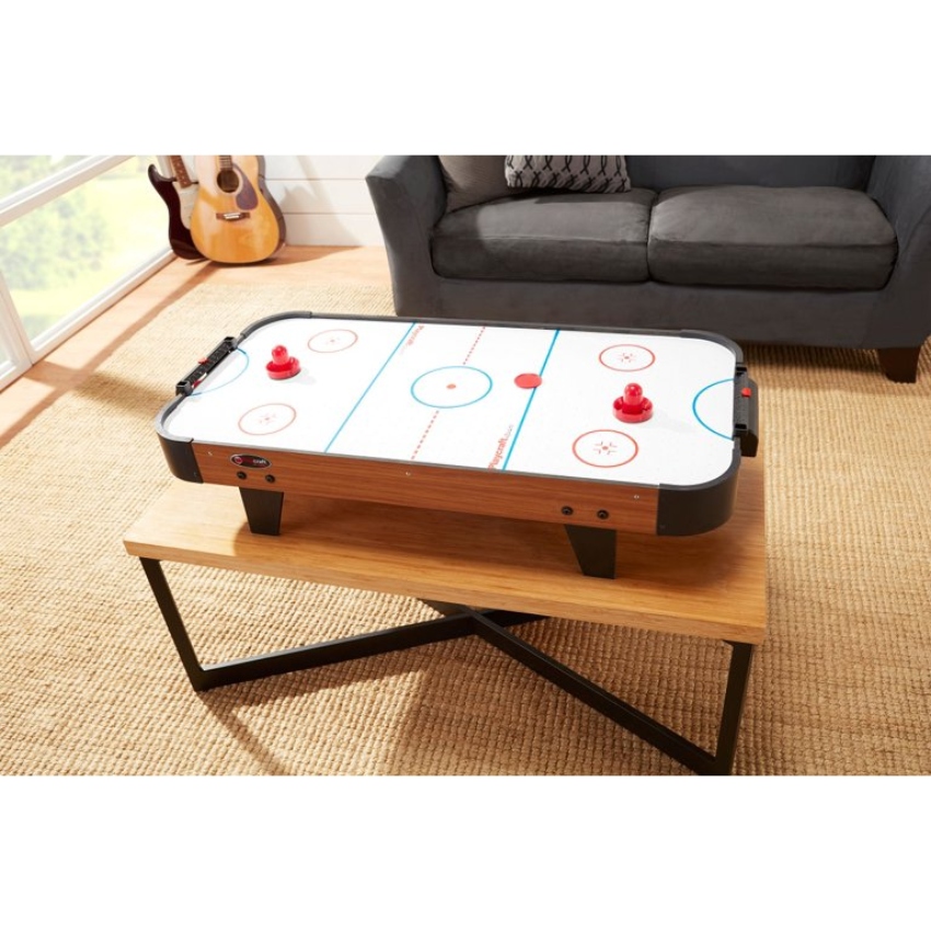 Playcraft Sport Table Top Air Hockey Table on a wooden table