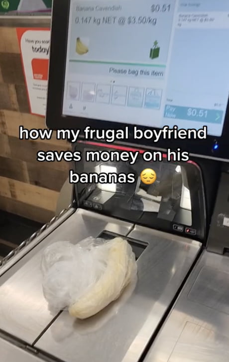 Unwrapped banana on a weighing scale at the supermarket