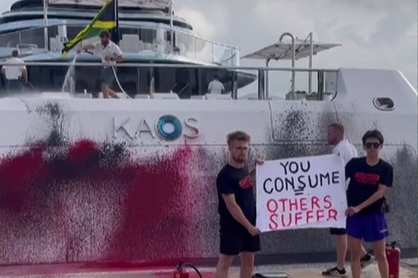 Boat Staff Had To Hose Down A $300 Million Yacht After Climate Activists Blasted Red And White Paint Onto It