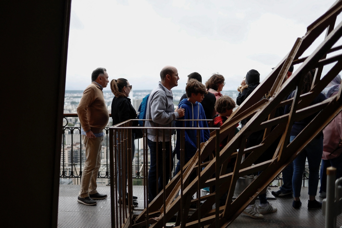 People in queue in Eiffel Tower