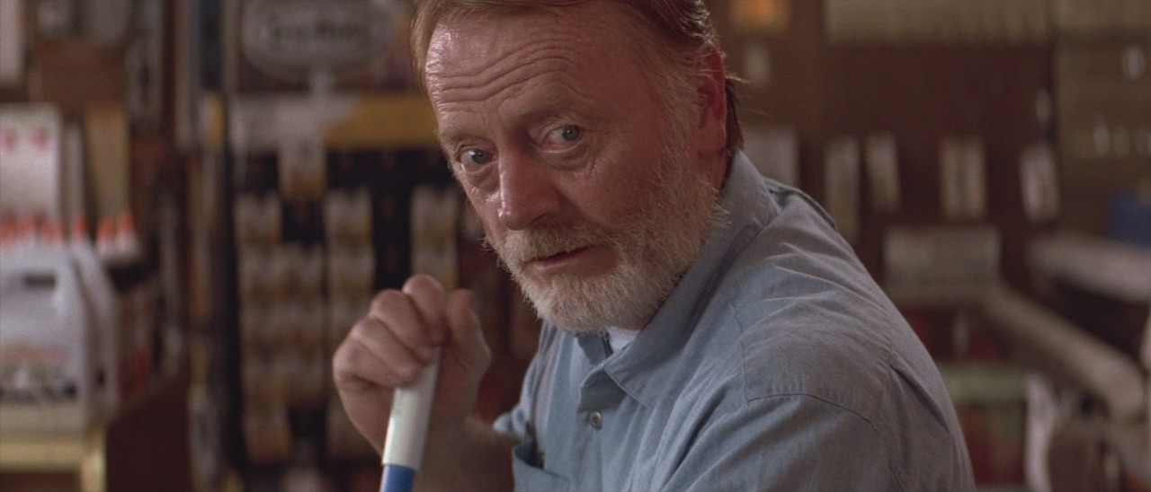 Red West as Red Webster in Roadhouse