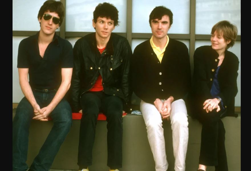 Members of the Talking Heads rock band sitting