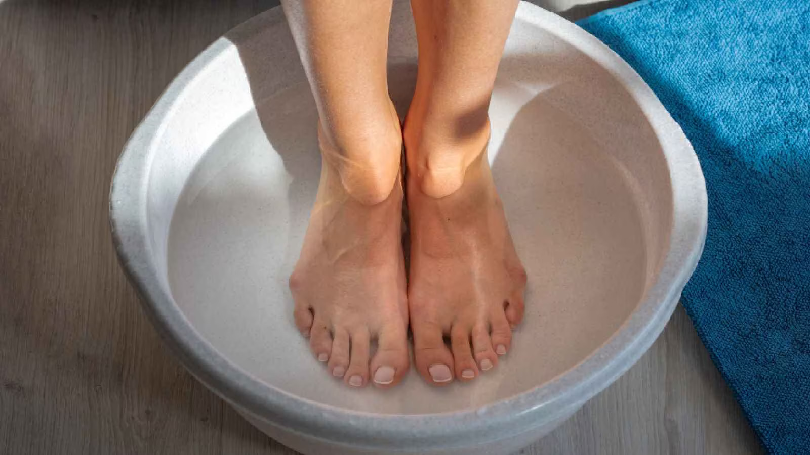 A woman's feet soaked in water