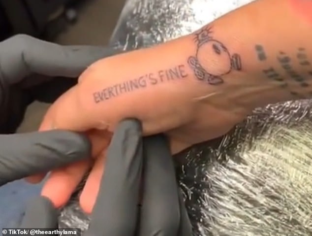 Tattoo of the woman who gone hysterical after wrong tattoo spelling.