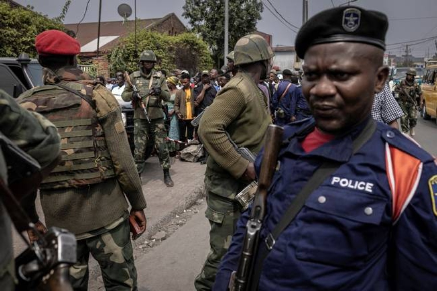 Police after a horrible bomb incident in Eastern Congo