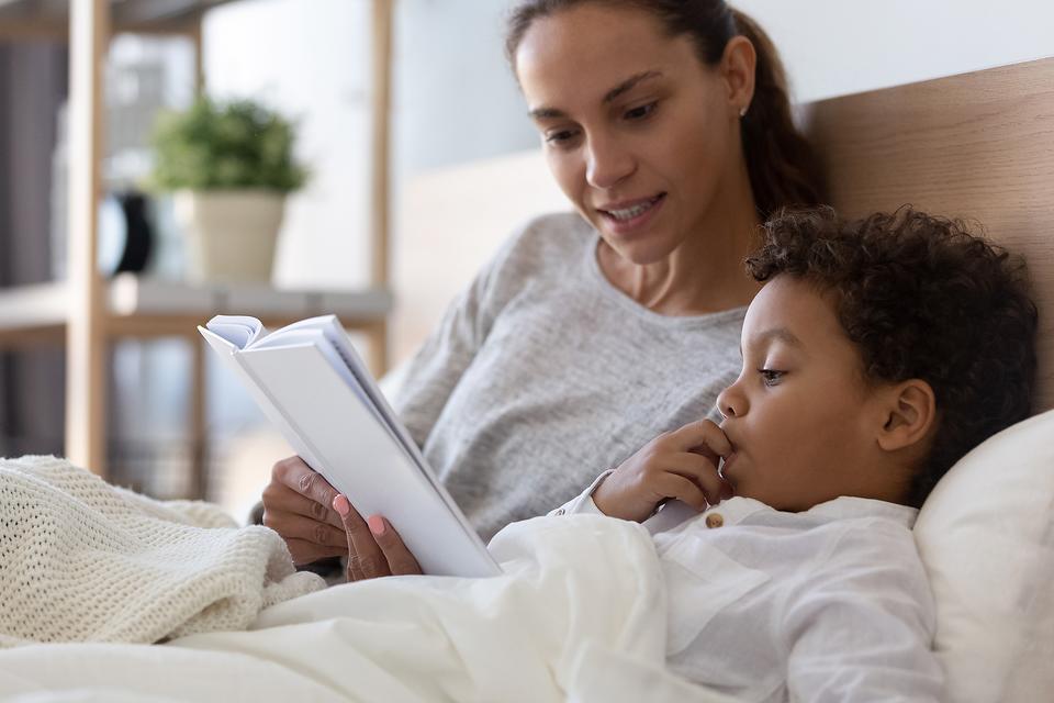 A mother and her child reading