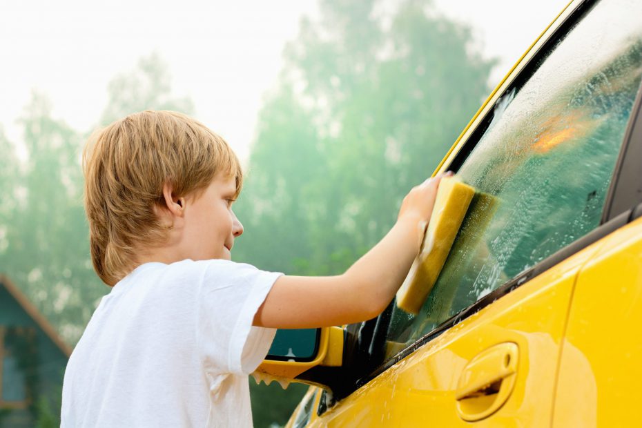 A child washing the car