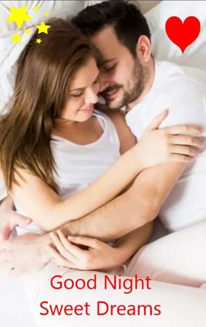 Two people sleeping in each other's arms